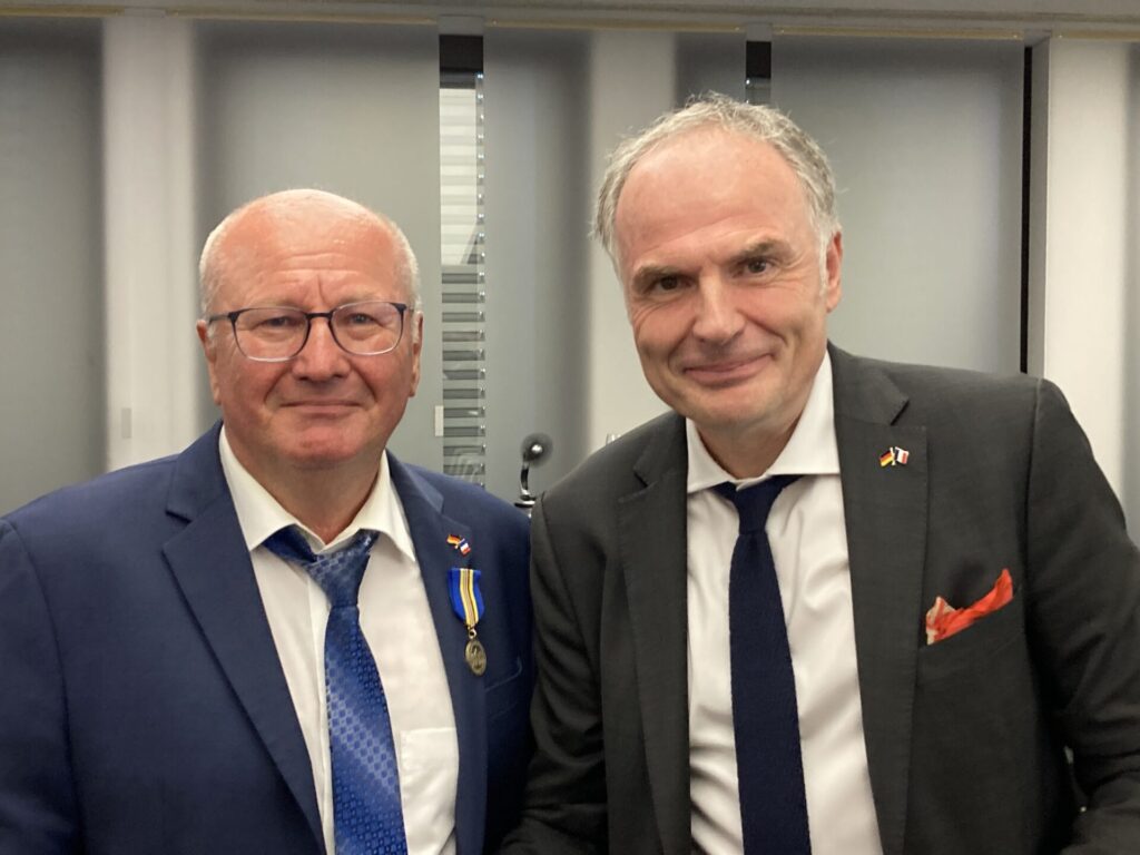 La photo montre Frank Eloy et Jérôme Spinoza